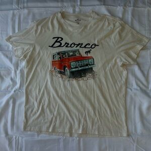 Cream colored Bronco t-shirt